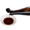 Yugeta organic soy sauce pouring to a small white plate 